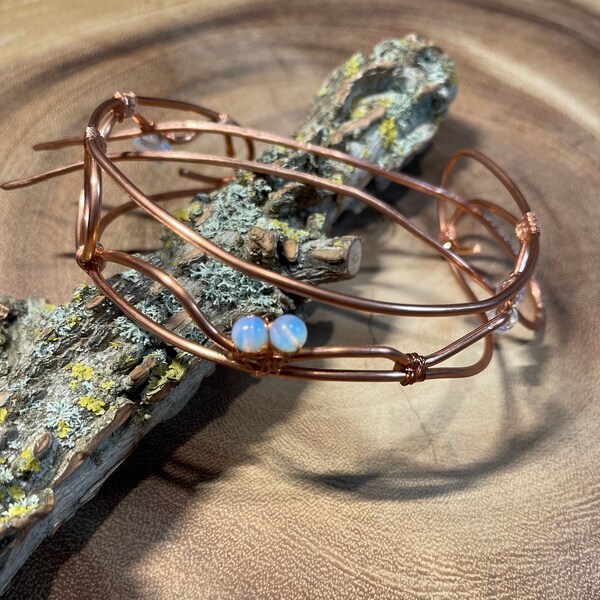 Buncage in moon shape made of copper wire with opalith balls D: 9.5 cm with copper hair fork 14 cm