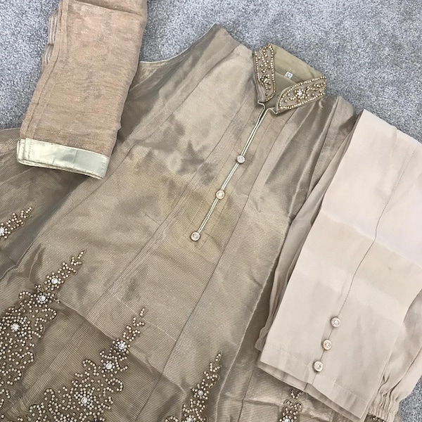 Gold trouser suit (size 32) and (size 34)