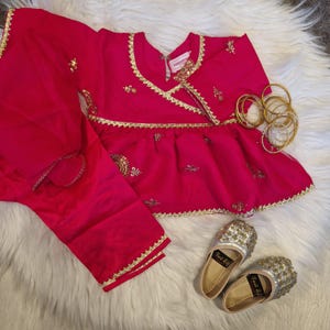 Dark pink frock with trousers