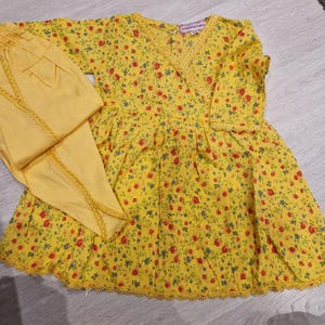 Yellow frock with tulip