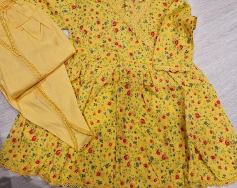 Vestido amarillo con tulipán (la parte de abajo es un poco pequeña)
