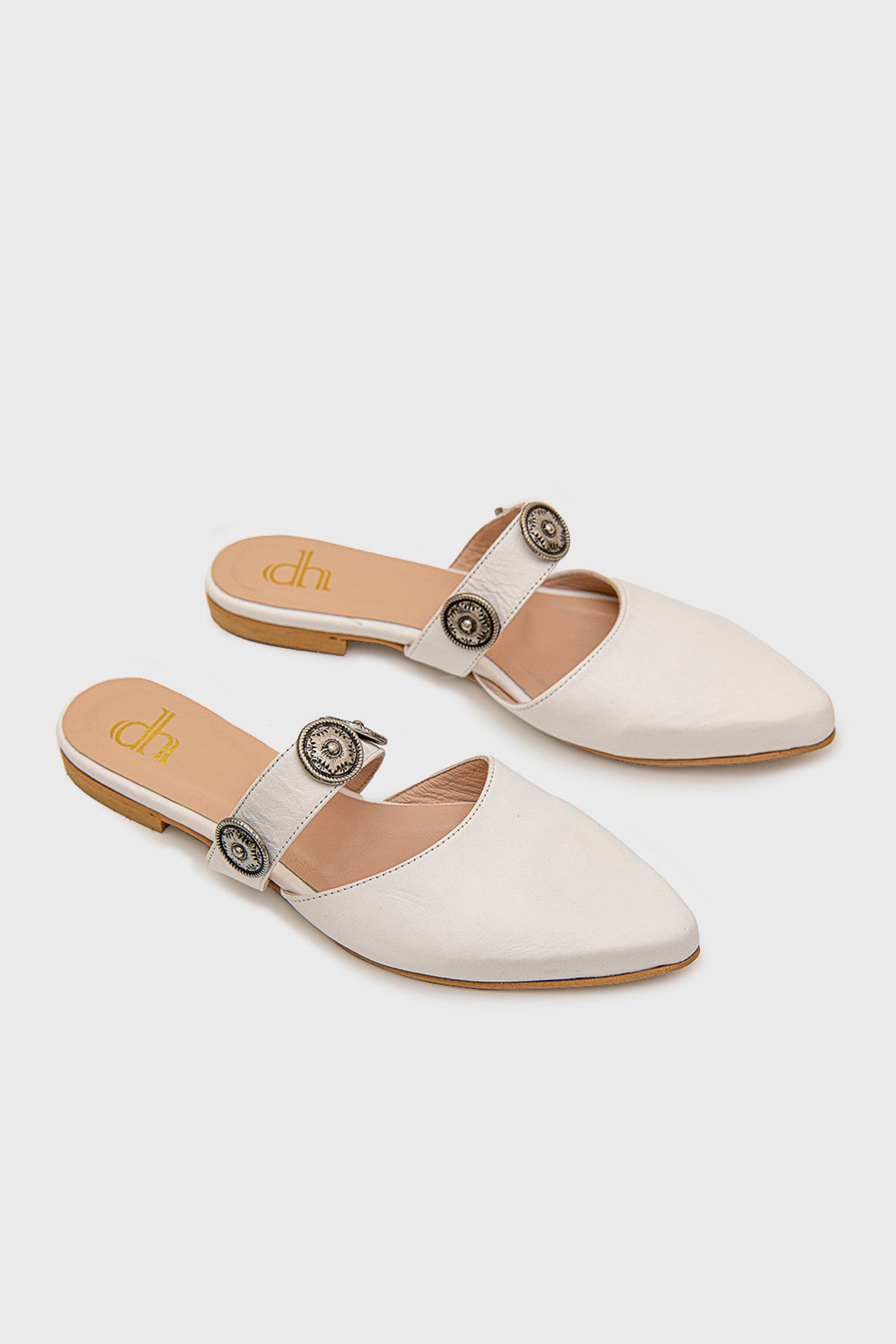 white pointed mule