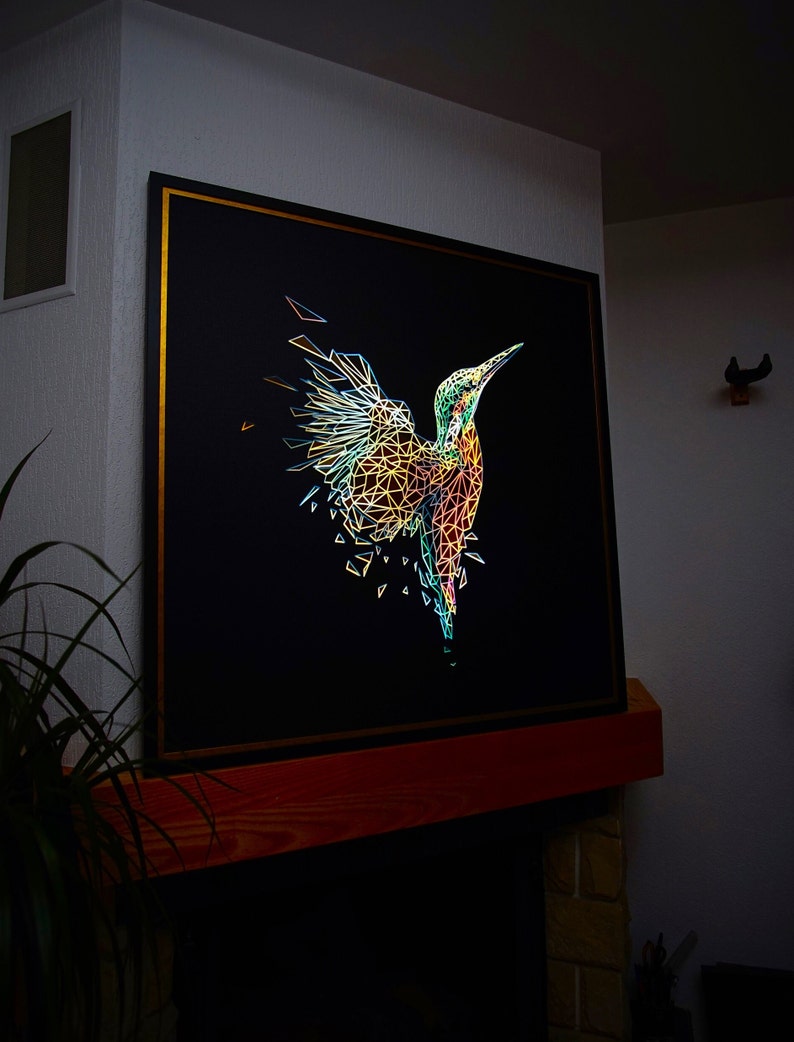 lighted kingfisher painting with the visible light effect and illumination in the dark