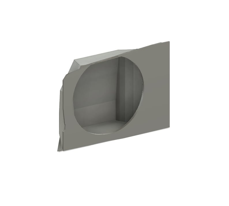 May include: A gray, geometric, three-dimensional object with a circular opening. The object has a box-like structure with a cut-out circle on one side, and is set against a white background.