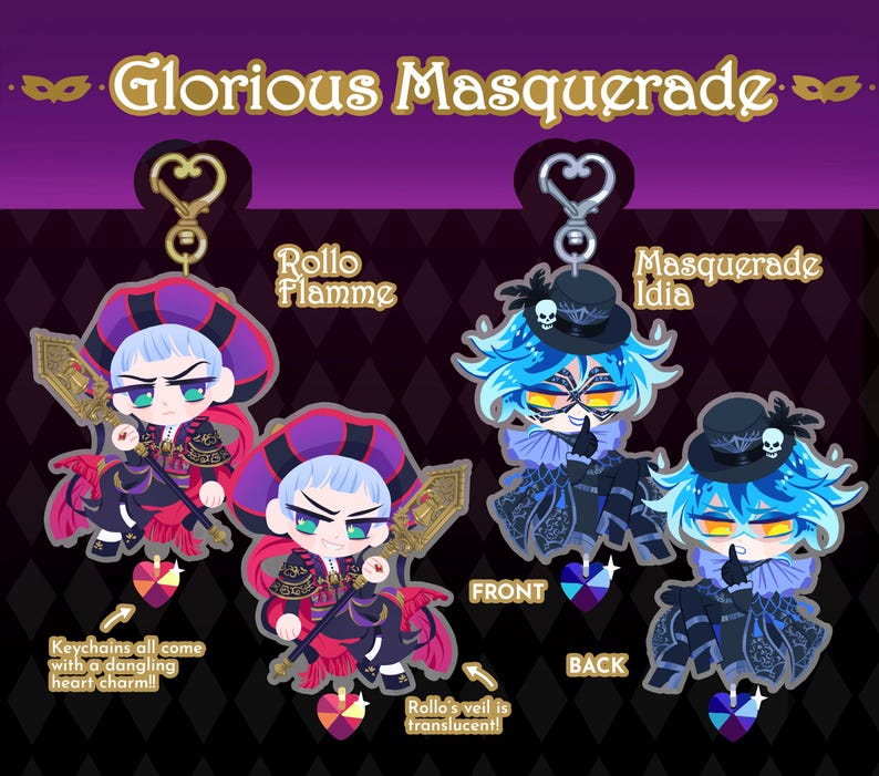 May include: Two character keychains featuring the characters Rollo Flamme and Masquerade Idia from the anime Twisted Wonderland. The keychains are in a chibi style and feature the characters in their masquerade outfits. The keychains come with a dangling heart charm.