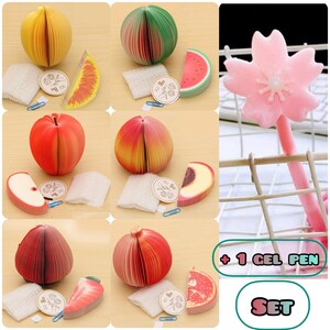 May include: Set of six colorful fruit-shaped sticky note pads with a matching gel pen. Each pad features a different fruit design, including watermelon, peach, apple, and more. The pads are perfect for adding a touch of fun to your desk or planner.