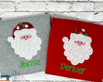 May include: Two red and grey Christmas shirts with a white embroidered Santa Claus face and green text. The text on the grey shirt says "Jhase" and the text on the red shirt says "Denver".
