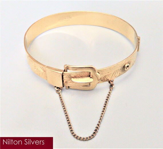 Excalibur rolled store gold bangle
