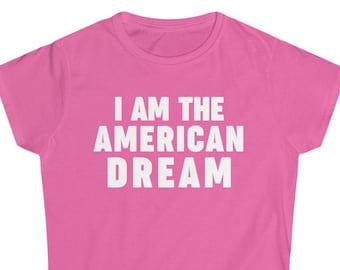 May include: Pink women's t-shirt with the text "I AM THE AMERICAN DREAM" in white.