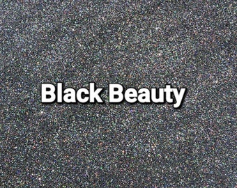 May include: Black glitter with a holographic finish. The glitter is very fine and has a subtle sparkle. The glitter is called "Black Beauty".