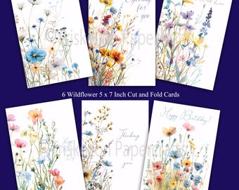 May include: Six 5 x 7 inch folded greeting cards featuring watercolor wildflower illustrations. The cards include text: With Sympathy, Especially for you, With Love, Happy Mother's Day, Thinking of you, and Happy Birthday. The designs feature colorful floral arrangements.