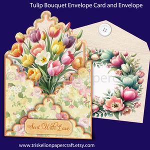 May include: An envelope card set with a tulip bouquet design. The card shows a colourful arrangement of yellow, pink, and purple tulips. The envelope has a floral border and a button closure. The card reads "Sent With Love".