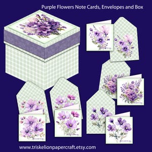 May include: A set of note cards and envelopes featuring purple flower illustrations, presented in a square box with a light green gingham pattern. The box lid displays a floral bouquet, and each card includes the text "Just a note to say..."