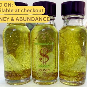Money and Abundance ritual oil with antique iron nails add-on