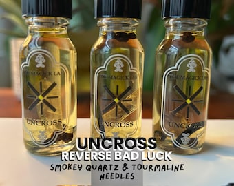 Aceite para deshacer hechizos: turmalina y cuarzo ahumado: rompe maleficios y revierte la mala suerte.