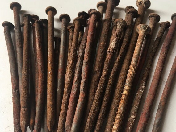 The diagram shows experiments involving the rusting of iron.The following  results were suggested.1 In tube P, the iron nails rust.2 In tube Q, the iron  nails do not rust.3 In tube R,