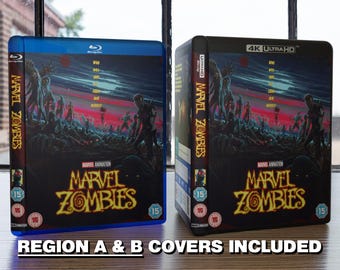 May include: Two Blu-ray and 4K Ultra HD cases for "Marvel Zombies" are displayed. The cases feature a dark, action-packed cover with zombie characters and the title in a stylized font. The text "REGION A & B COVERS INCLUDED" is at the bottom.