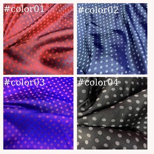 May include: Four fabric swatches with a polka dot pattern. The swatches are in the colors red, blue, purple, and black.