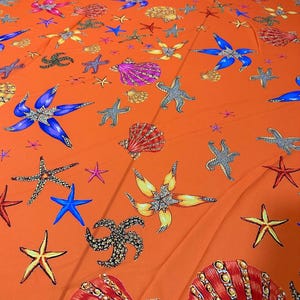 Orange Oyster Sea Shell Fabric: Vibrant Sewing & Craft Design