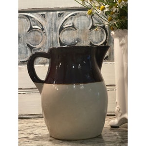 Roseville Tri Tone Brown Handled Pitcher