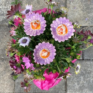 Garden stake flowers made of ceramic
