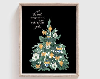 May include: A framed print featuring a watercolor Christmas tree with gold ornaments and bows against a black background. The text "It's the most wonderful time of the year" is written in elegant script. The print is in a light wood frame.