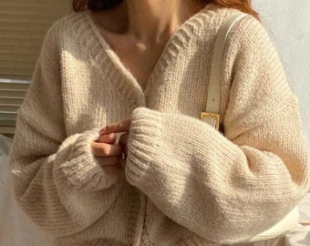 Cardigan corto in stile ampio