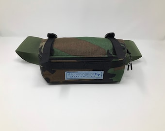 Little Bum Pack Camo. Same as a fanny pack/waist pack/ lumbar pack