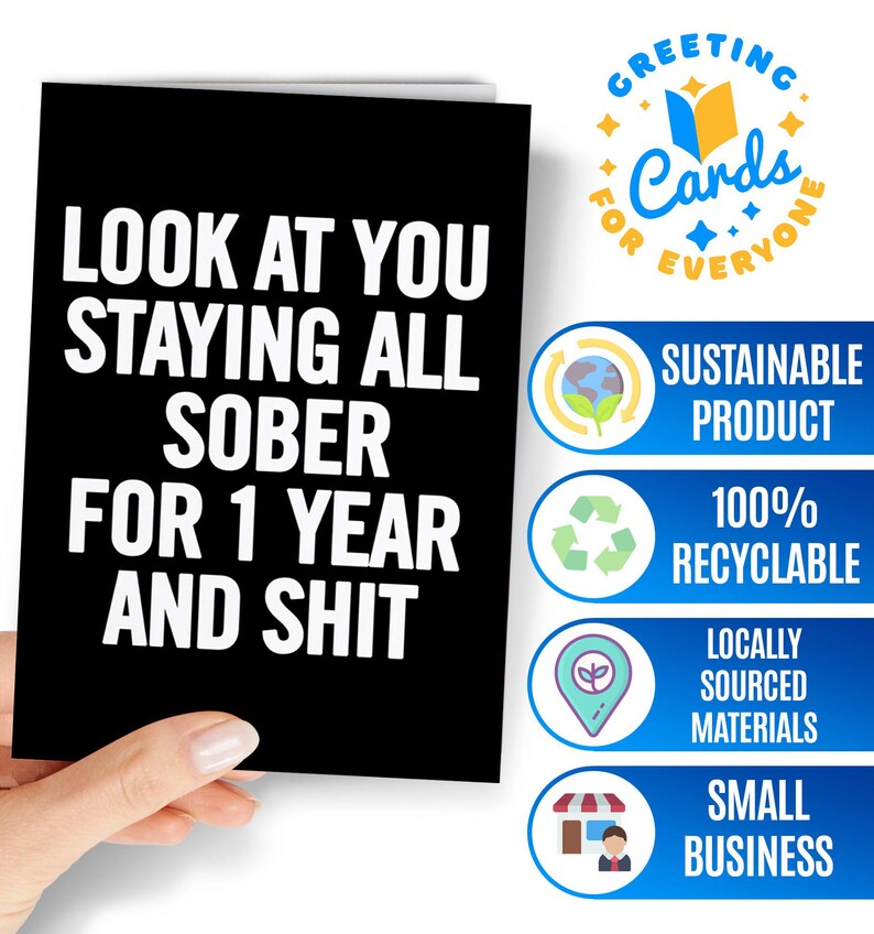 May include: A black greeting card with white text that reads, LOOK AT YOU STAYING ALL SOBER FOR 1 YEAR AND SHIT. The card is rectangular with a clean, bold font and a matte finish, presenting a straightforward design for a sobriety milestone celebration.