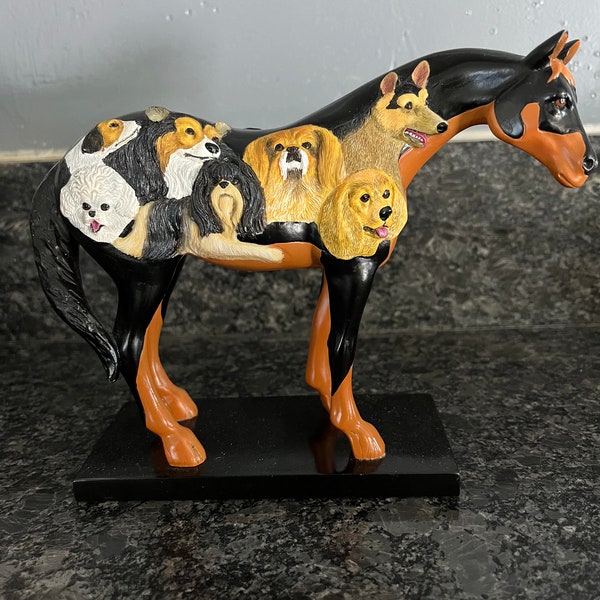 The Trail of Painted Ponies. Dog and pony show. Horse statue.