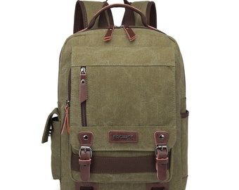 May include: A green canvas backpack with brown leather accents and buckles. The backpack has a large main compartment, a smaller front pocket, and two side pockets. The brand name "BAGWISE" is printed on the front of the backpack.