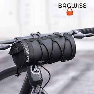 May include: A black cylindrical bicycle handlebar bag featuring the text BAGWISE printed vertically on the side. The bag includes a top zipper closure, adjustable straps for mounting, and a black elastic cord lacing system on the front exterior.