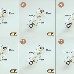 Peut inclure: Ensemble de six poign&eacute;es de meubles dor&eacute;es. Chaque poign&eacute;e mesure 230 mm de long, 96 mm entre les trous de montage et 32 mm de haut. Elles ont des extr&eacute;mit&eacute;s en forme d'anneau et p&egrave;sent 110G.