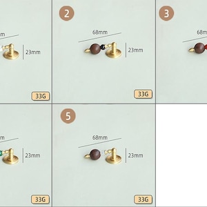Peut inclure: Ensemble de cinq boutons de meuble en laiton, chacun avec une perle de couleur diff&eacute;rente. Les boutons mesurent 2,3 cm de haut et 6,8 cm de large. Chaque bouton a une petite base ronde et une perle d&eacute;corative.