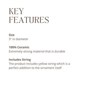 May include: Text on a white background reads "KEY FEATURES." Below, it lists the size as 3" in diameter, material as 100% ceramic, and includes a yellow string. The ceramic material is described as extremely strong and durable.