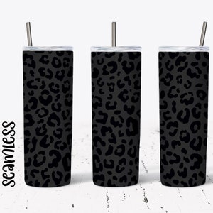 May include: Three black stainless steel tumblers with black leopard print designs and matching black straws.