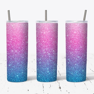 May include: Three stainless steel tumblers with a pink and blue glitter ombre design.