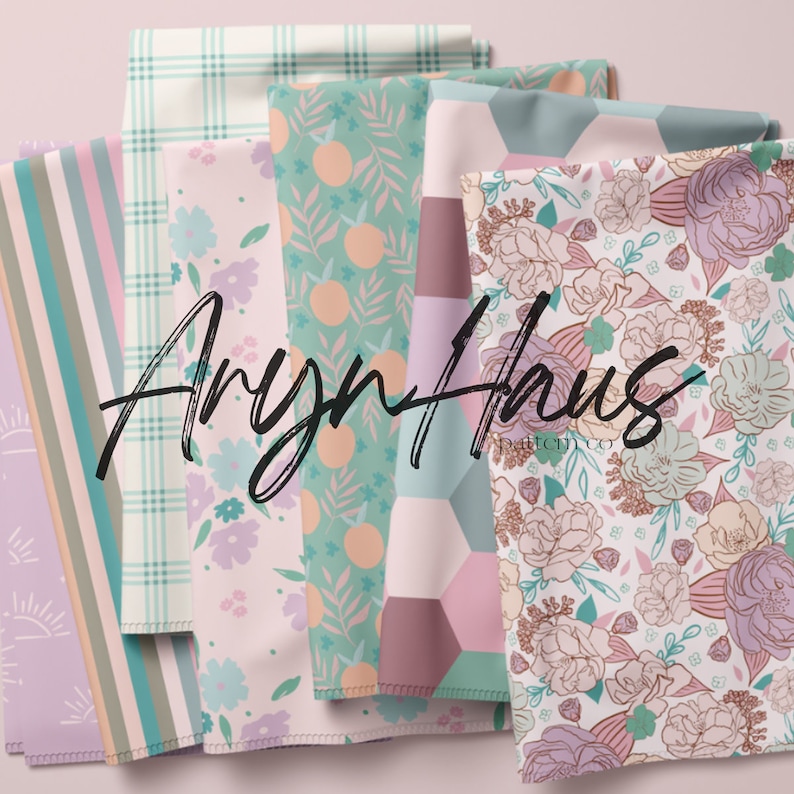 May include: A selection of patterned fabrics in diverse designs and colours. The fabrics feature floral, geometric, and striped patterns in shades of pink, green, and purple. The text "Aryn Haus pattern co" is displayed in a cursive font.