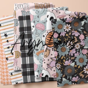 May include: A selection of patterned fabrics with Halloween and floral designs. Patterns include stripes, stars, plaid, and repeating images of ghosts, skulls, and the word "BOO!". Colours include black, white, orange, pink, and blue.