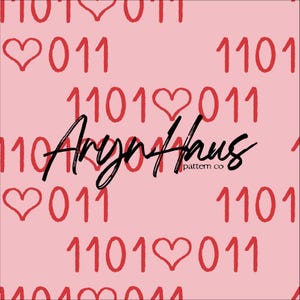 May include: A pink background featuring a repeating pattern of red hearts, binary code, and the text "Argon Haus pattern co" in a black script font. The hearts and binary code are scattered across the surface.