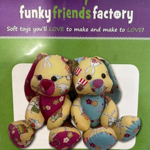 May include: Two soft toy Easter bunnies with yellow, pink, and blue patterned fabric. The bunnies are 15 inches (38cm) tall when standing and 22 inches (56cm) with ears up. The packaging reads "funky friends factory" and "EASTER BUNNY Buddies."