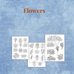 May include: Three white sheets with black line drawings of various flowers and floral arrangements. The word "Flowers" is written in orange block letters at the top. The background is a light blue denim.