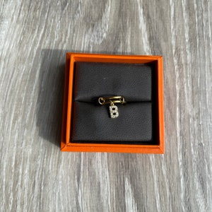 Gold initial ring