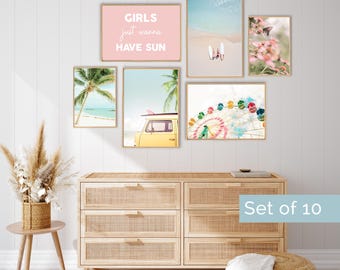 May include: A set of six framed wall art prints featuring a pink sign with the text GIRLS just wanna HAVE SUN, a beach scene with surfboards, a butterfly on flowers, a palm tree, a yellow van, and a colorful Ferris wheel on a white wall.