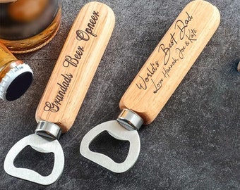 May include: Two wooden bottle openers with engraved text. One says "World's Best Dad Love Hannah, Joe & Kate" and the other says "Grandad's Beer Opener".
