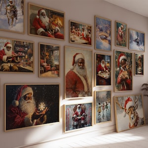 May include: A collection of framed art prints featuring Santa Claus in various scenes. The artwork showcases Santa in a red suit, with a white beard, and a black complexion. The prints are displayed on a light-colored wall.