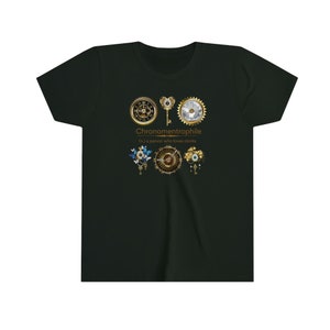 May include: Dark green t-shirt featuring a design with clockwork gears, keys, and other clock-related elements in gold and silver. The text "Chronomentrophile (n.) a person who loves clocks" is printed below the design.