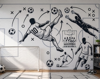 May include: A wall mural featuring a black and white soccer theme with illustrations of players in action, a goalkeeper diving, a team formation diagram, soccer balls, and tactical arrows overlaid on a light gray soccer field grid pattern.
