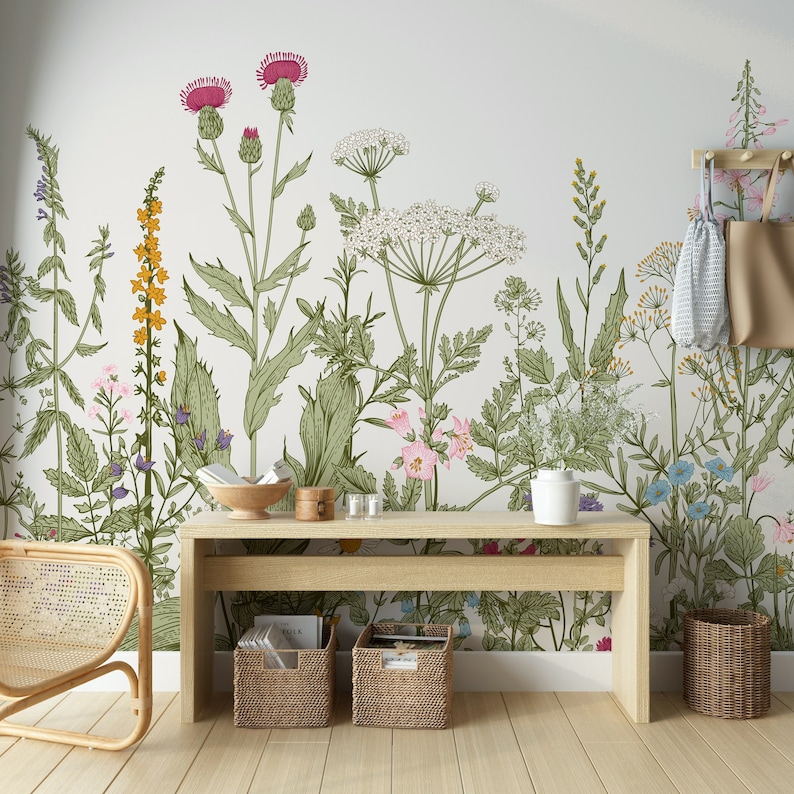 May include: A light wood console table with two shelves, a woven basket, and a floral wallpaper featuring a variety of flowers and plants in shades of green, pink, and yellow.