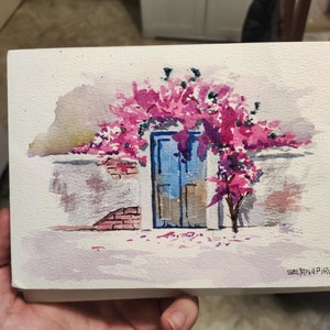 Watercolor of a door with flowers
